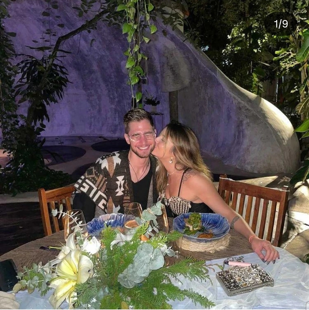 Anthony and Raisa at a dinner in Tulum