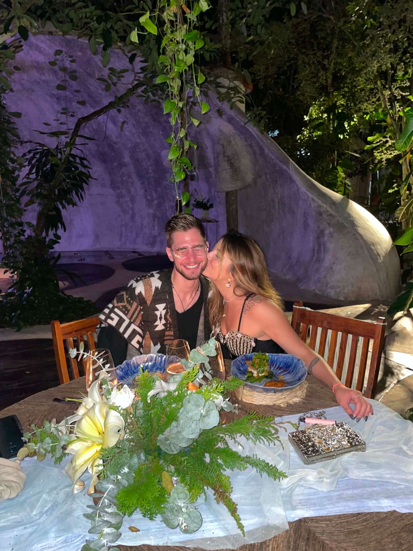 Anthony and Raisa at dinner in Tulum